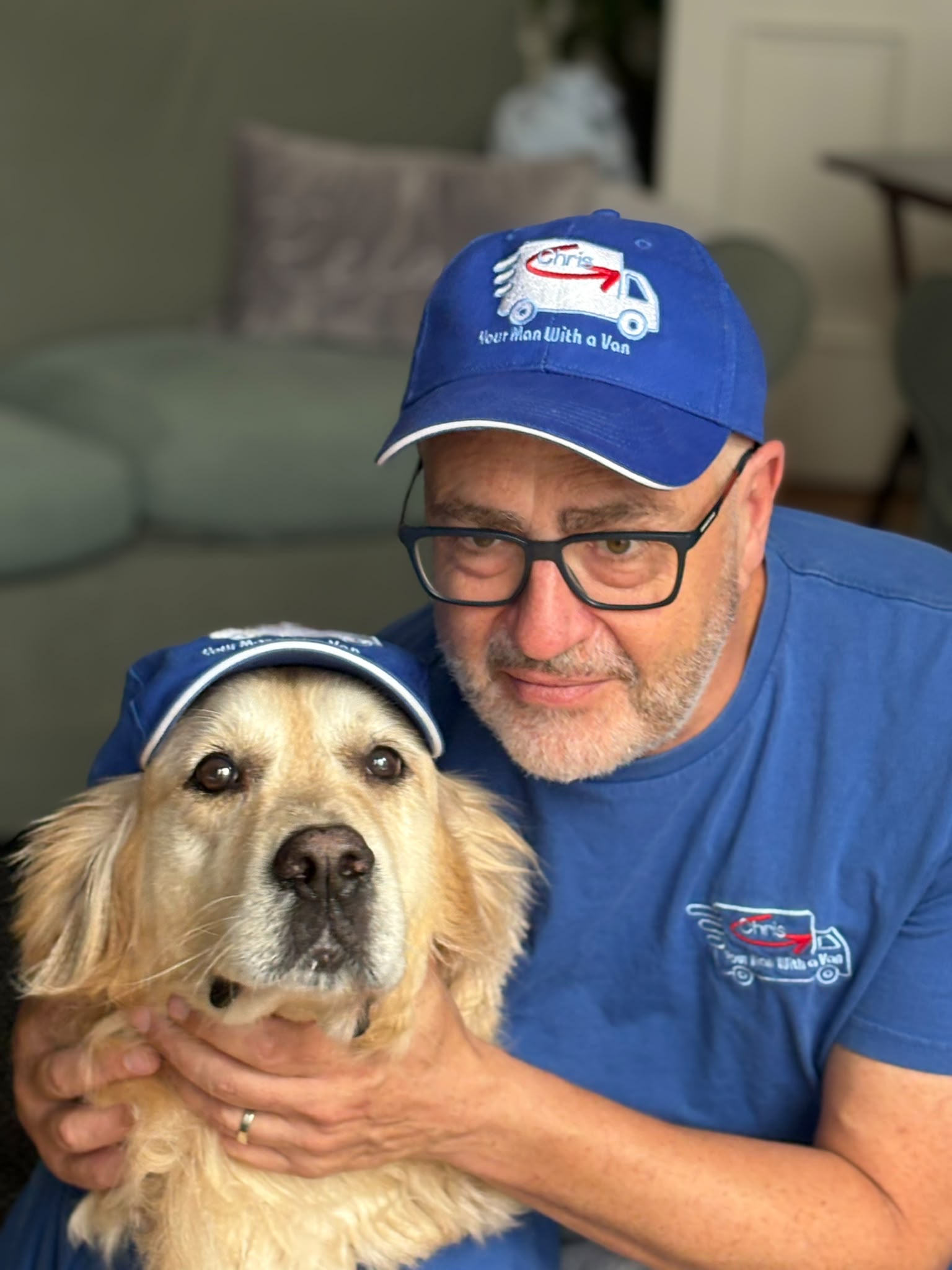 Chris and his dog in branded gear