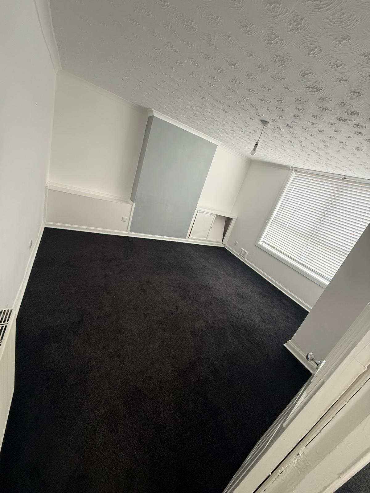 Cleared living room, ready for handover